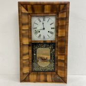 A late 19th century rosewood cased American style wall clock. 65x39cm.