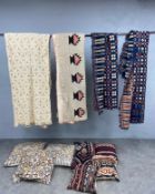A miscellaneous collection of textiles: Two bedspread, two rugs and eight cushions. 250x240cm. (