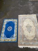 A Persian style carpet and a Chinese rug. 240x142cm. (Largest).