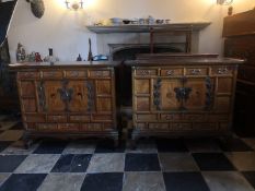A pair of C.1900 Korean elm cabinets with brass butterfly locks and hinges fitted with an