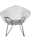A vintage Harry Bertoia Diamond chair with wirework frame on metal supports. H.74cm.