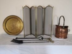 A set of Regency steel and brass fire irons along with other brass items.