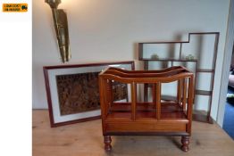 A canterbury style magazine rack, a glazed carved panel and a set of hanging wall shelves.