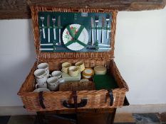 An Antler picnic set in fitted wicker case. H.21 W.66 D.39cm.