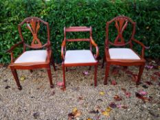 A pair of contemporary Georgian style teak armchairs and a Regency style similar. H.98cm.