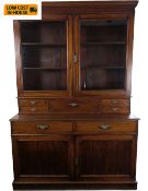 A 19th century mahogany library bookcase in two sections, the upper with glazed doors enclosing