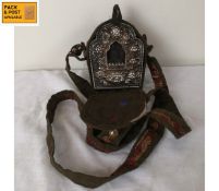A small Tibetan travelling Gau or Ghau shrine box in repousse metal case decorated with auspicious