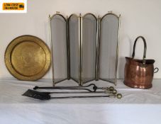 A set of Regency steel and brass fire irons along with other brass items.