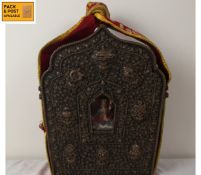 A Tibetan travelling Gau or Ghau shrine box in repousse metal case decorated with auspicious