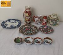 A mixed collection of Japanese and Oriental style ceramics to include blue and white porcelain bowls