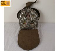 A Tibetan travelling Gau or Ghau shrine box in repousse metal case decorated with auspicious