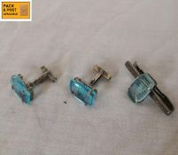 A gentlemen's silver and blue topaz tie pin and cufflinks set with impressed marks. Gross weight: