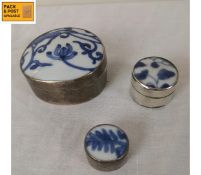 Three silver pill boxes with hand painted blue and white porcelain lids, marked 925. gross weight