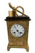 AN EARLY 19TH CENTURY FRENCH GILT BRONZE MANTEL CLOCK 'LA BIBLIOTHEQUE'