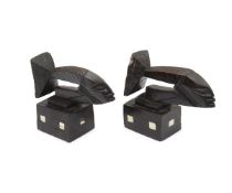 A PAIR OF MAORI STYLE CARVED WOOD FLYING FISH BOOKENDS