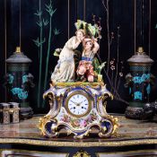 A MID 19TH CENTURY PORCELAIN DE PARIS FIGURAL MANTEL CLOCK