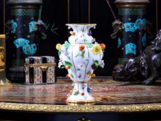 MEISSEN: A LATE 19TH CENTURY PORCELAIN VASE WITH APPLIED FLOWERS