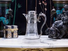 A FINE AND LARGE 19TH CENTURY STERLING SILVER AND ETCHED GLASS CLARET JUG C. 1867, LONDON