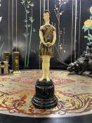 AN ART DECO STYLE COLD PAINTED BRONZE FIGURE OF A GIRL