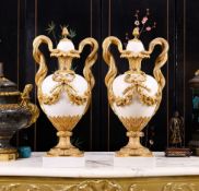 A FINE AND LARGE PAIR OF 19TH CENTURY MARBLE AND ORMOLU MOUNTED URNS AND COVERS