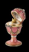 A FABERGE STYLE DIAMOND ENCRUSTED, 14CT GOLD, SILVER AND GUILLOCHE ENAMEL SURPRISE EGG