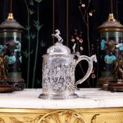 A LARGE GERMAN SILVER TANKARD DEPICTING NAPOLEON