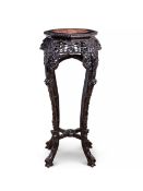 A LATE 19TH CENTURY CHINESE CARVED HARDWOOD AND MARBLE STAND