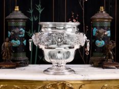 A LARGE SILVER WINE COOLER