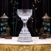 A LARGE CRYSTAL GLASS CENTREPIECE BOWL ON STAND