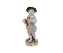 MEISSEN: A 19TH CENTURY FIGURE OF A BOY FLAUTIST CIRCA 1850.