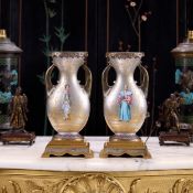 A PAIR OF LATE 19TH CENTURY FRENCH ORMOLU MOUNTED JAPONAISERIE VASES