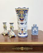 A DESVRES FRENCH FAIENCE VASE TOGETHER WITH A PAIR OF CANDLESTICKS AND TEA CADDY