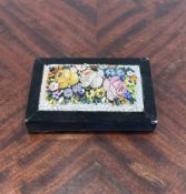 A 19TH CENTURY ITALIAN MICROMOSAIC PAPERWEIGHT