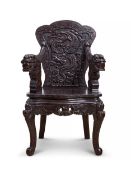 A CHINESE CARVED HARDWOOD CHILDRENS' CHAIR