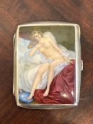 AN EARLY 20TH CENTURY SILVER AND ENAMEL EROTIC CIGARETTE CASE