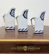 ROYAL WORCESTER: A SET OF THREE AESTHETIC STYLE PORCELAIN JUGS C. 1870