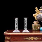 A PAIR OF EARLY 20TH CENTURY CHINESE EXPORT SILVER CANDLESTICKS MARKED FOR WANG HING