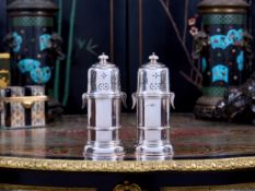 A LARGE PAIR OF EARLY 20TH CENTURY BRITANNIA SILVER SUGAR SIFTERS C. 1903