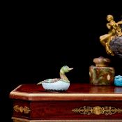 A CHINESE SILVER, ENAMEL AND HARD STONE MOUNTED MODEL OF A DUCK