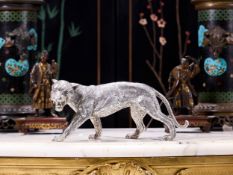 A SILVER MODEL OF A LEOPARD