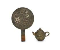 AN EARLY 20TH CENTURY CHINESE BRONZE TEAPOT AND A STAND