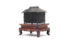 A 19TH CENTURY JAPANESE MEIJI PERIOD BRONZE BOX MODELLED AS A HOUSE