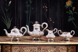 AN IMPRESSIVE WILLIAM IV PERIOD STERLING SILVER FOUR PIECE TEA SET C. 1836