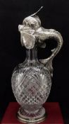 POSSIBLY FABERGE: A SILVER AND CUT GLASS DECANTER