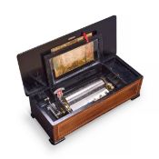 A FINE LATE 19TH CENTURY SWISS BURR WALNUT MUSIC BOX PLAYING SIX TUNES