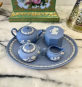 A WEDGWOOD JASPERWARE MINIATURE TEA SET