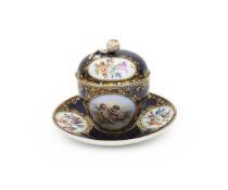 A 19TH CENTURY BERLIN KPM PORCELAIN CHOCOLATE CUP AND COVER
