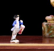 MEISSEN: A LATE 19TH CENTURY PORCELAIN FIGURE OF A DRUMMER BOY