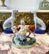 A PAIR OF STAFFORDSHIRE POTTERY DALMATIONS TOGETHER WITH A FURTHER GROUP