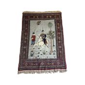 A PERSIAN RUG DEPICTING KING NASER AL-DIN SHAH QAJAR